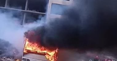 السيطرة على حريق أتوبيس في حدائق أكتوبر