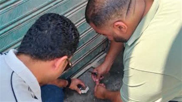 محلى نجع حمادي: غلق وتشميع محلين وإزالة 20 لافتة مخالفة